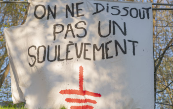 Une banderole lors d'un rassemblement de soutien aux Soulèvements de la Terre, le 19 avril 2023, à Paris.